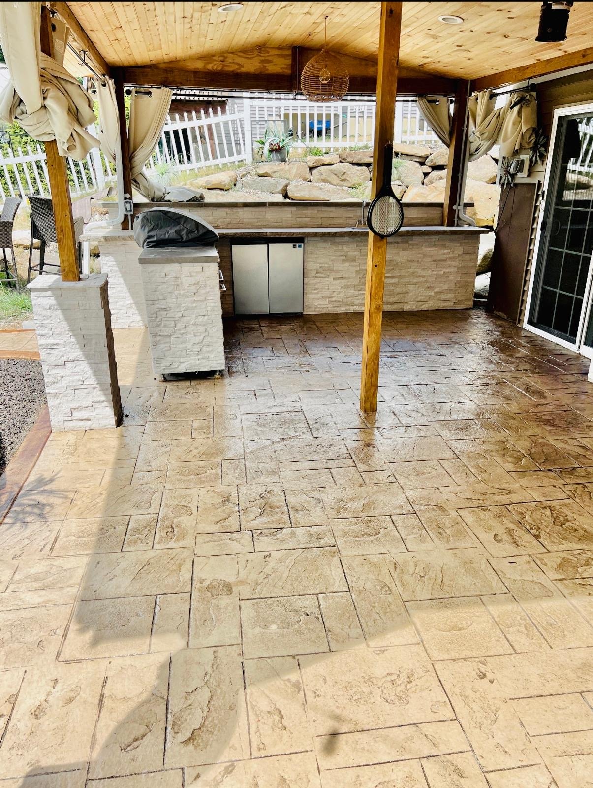 Covered patio and outdoor living project by M&S